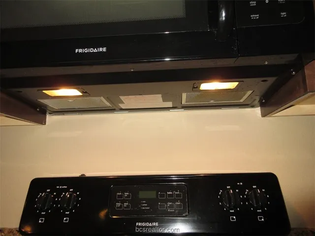 a view of a fence in front of a house