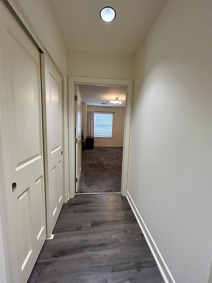 1849 Green Bay Road, Unit 2E Highland Park, IL 60035 - Photo 13 of 23 a view of a hallway with wooden floor