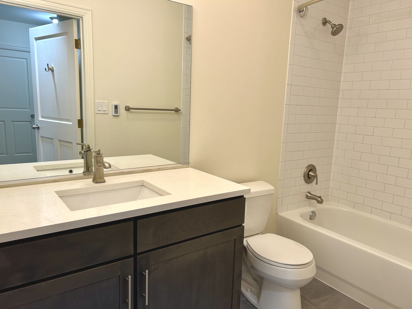 1849 Green Bay Road, Unit 2E Highland Park, IL 60035 - Photo 18 of 23 a bathroom with a sink and a mirror