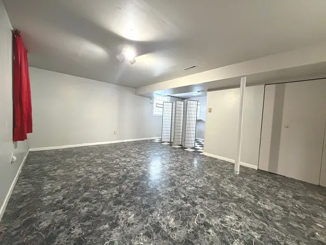 a view of a livingroom with a staircase