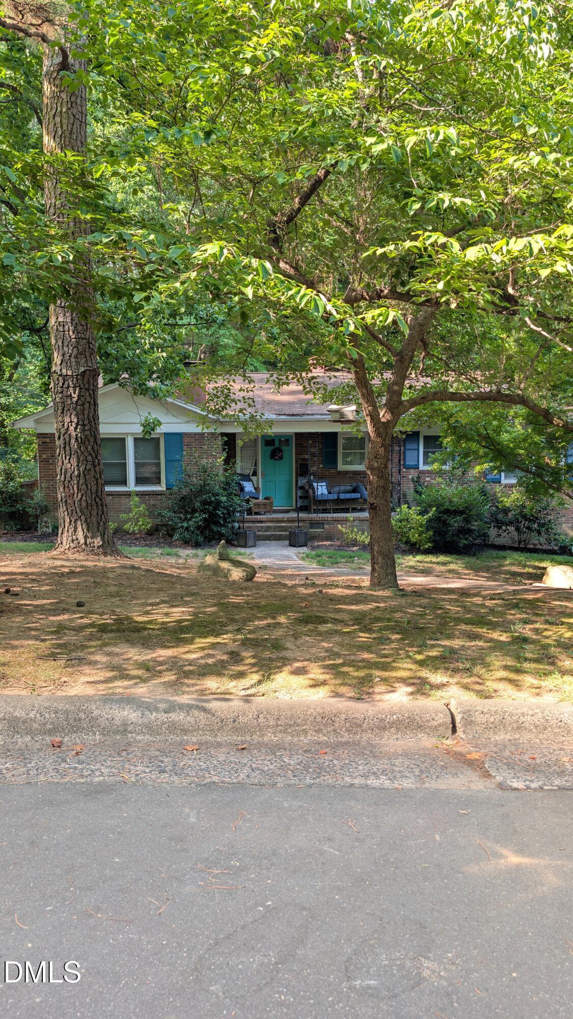105 Lexington Road Chapel Hill, NC 27516 - Photo 1 of 13 PXL_20260704_133133040