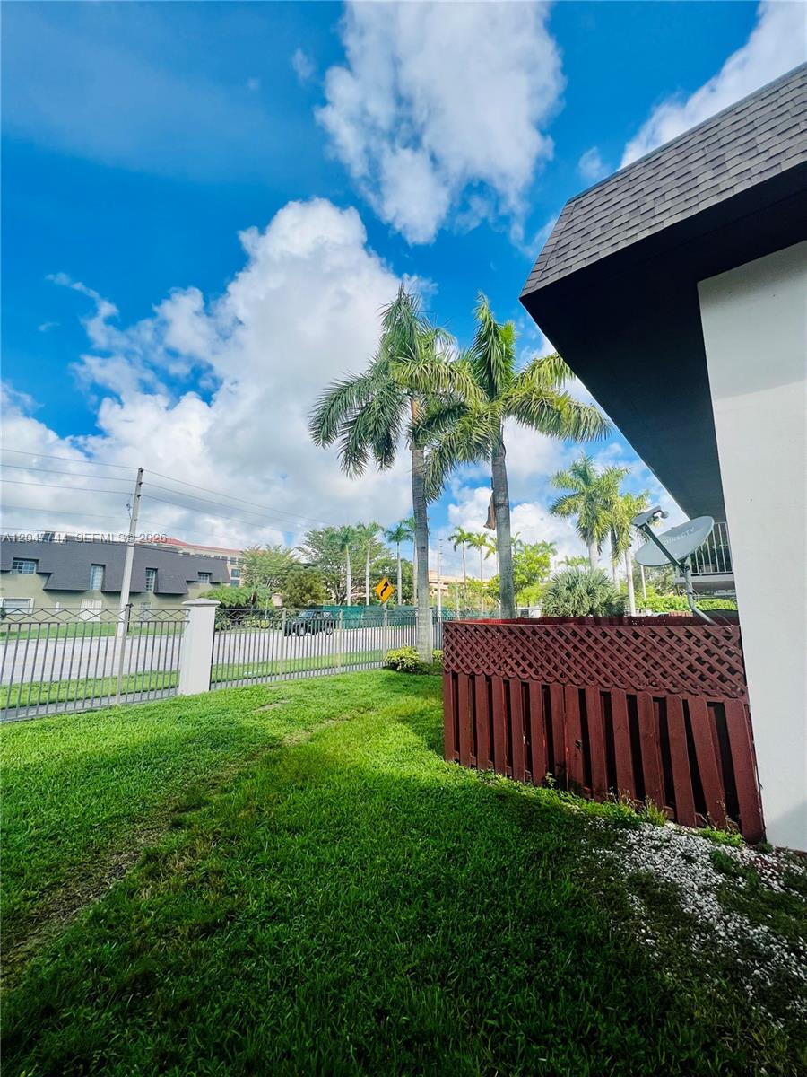 8601 Southwest 94th Street, Unit 105W Miami, FL 33156 - Photo 20 of 24 Fenced Patio looking at Baptist Hospital