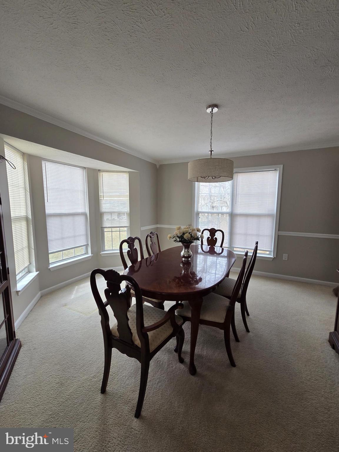 1104 Old Cannon Road Fort Washington, MD 20744 - Photo 17 of 32 a view of a dining room with furniture window and wooden floor