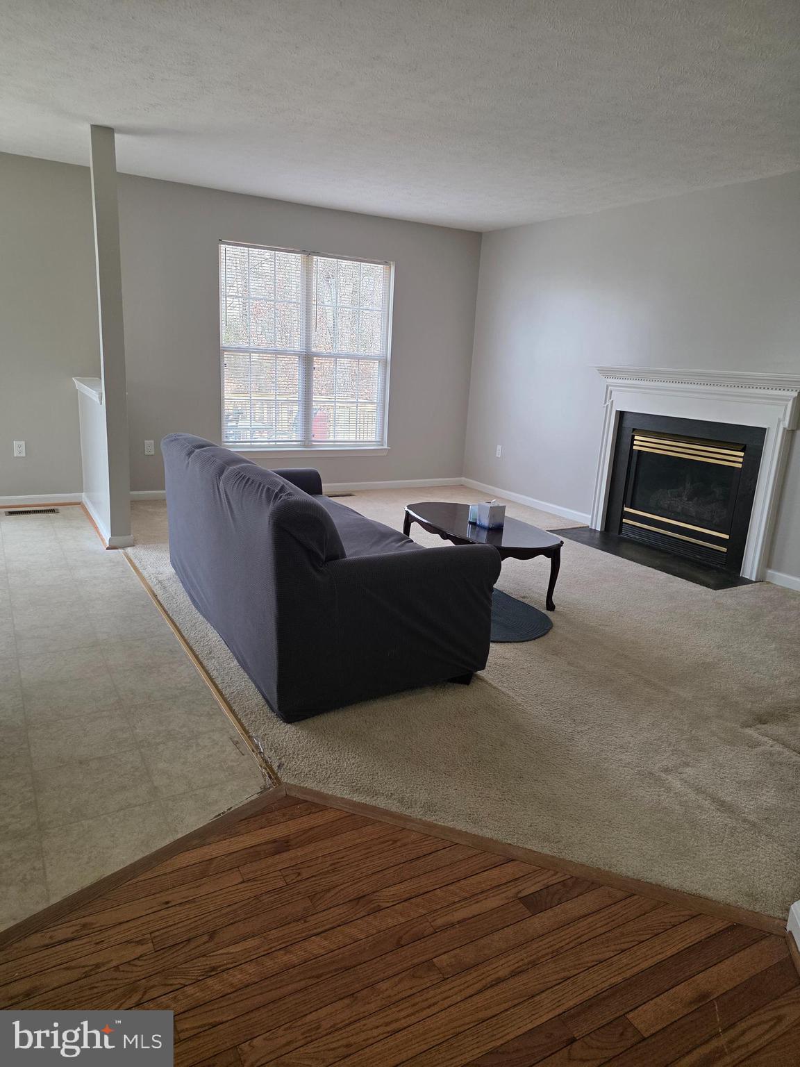 1104 Old Cannon Road Fort Washington, MD 20744 - Photo 18 of 32 a living room with furniture and a window