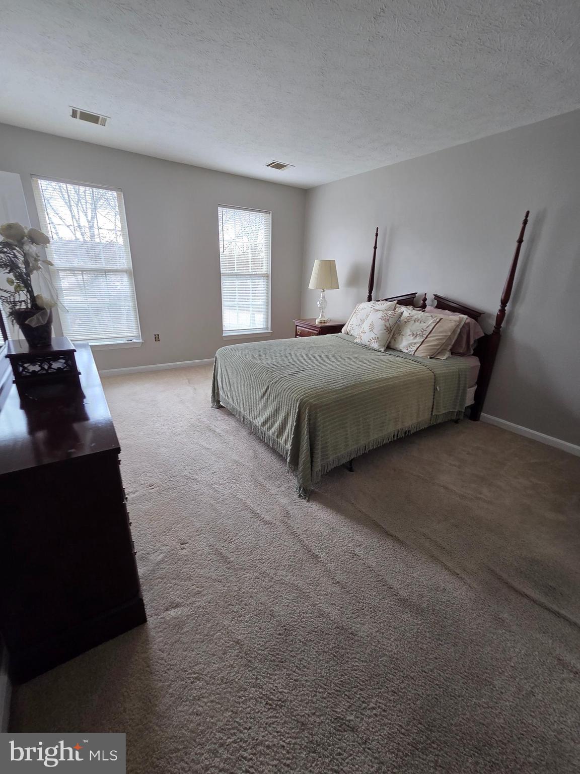 1104 Old Cannon Road Fort Washington, MD 20744 - Photo 23 of 32 a bedroom with a bed and a window