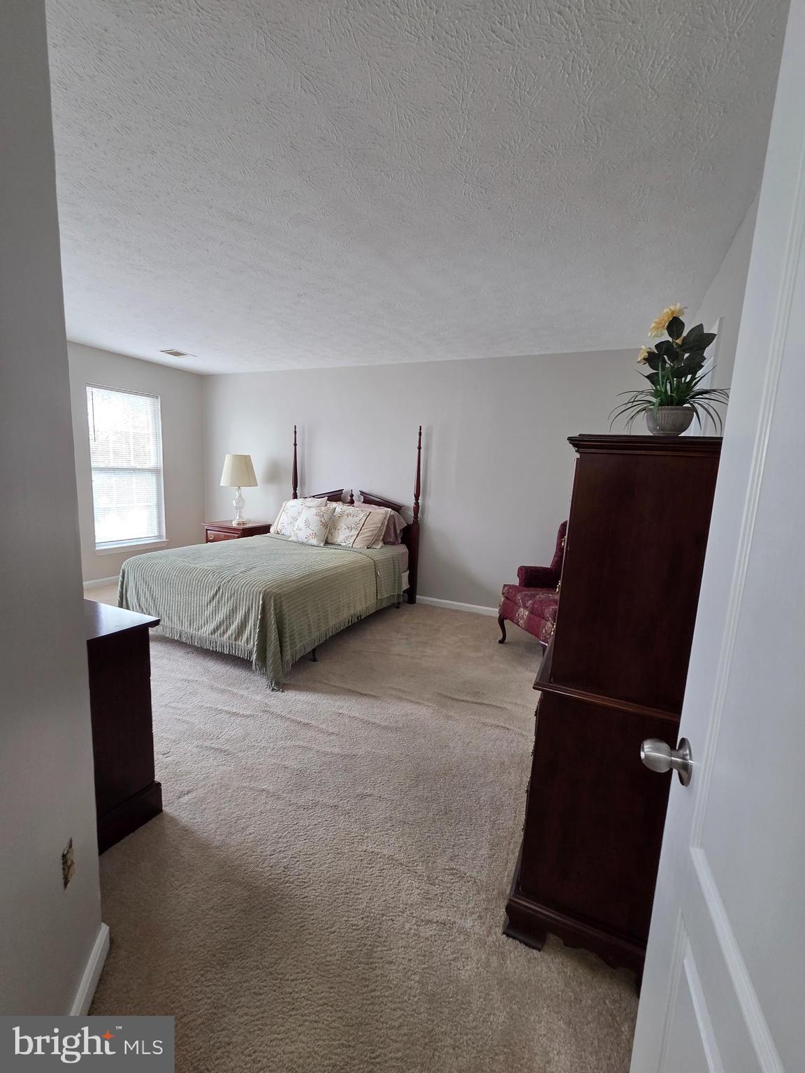 1104 Old Cannon Road Fort Washington, MD 20744 - Photo 25 of 32 a bedroom with bed and window