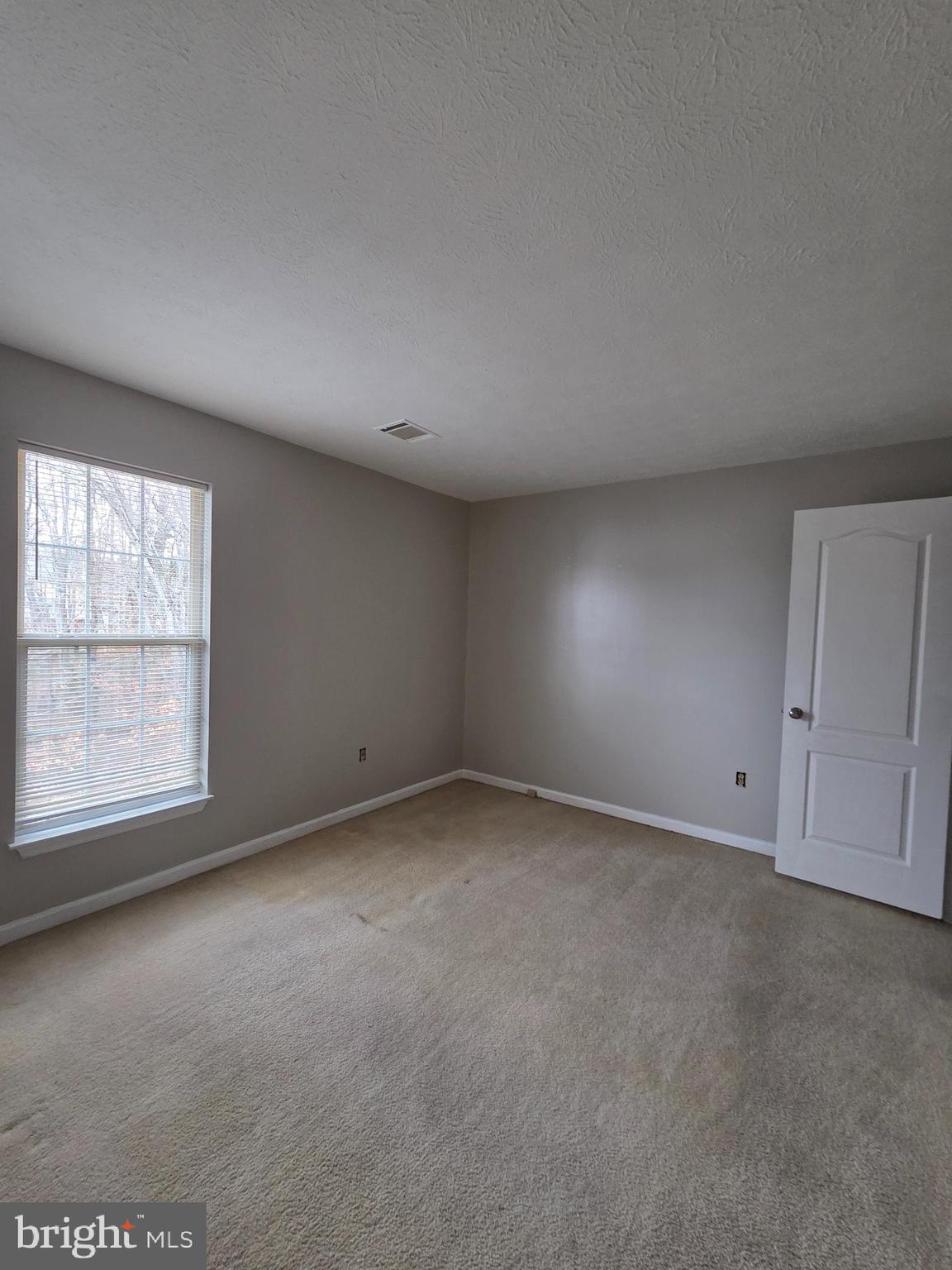 1104 Old Cannon Road Fort Washington, MD 20744 - Photo 30 of 32 an empty room with a window