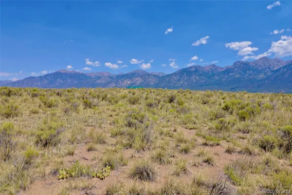 a view of a lake with a mountain in the background