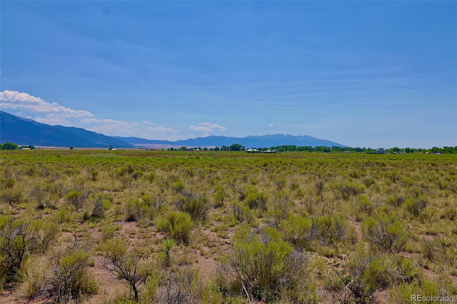 691 Birch Road Crestone, CO 81131 - Photo 5 of 16 a view of a city with an ocean view