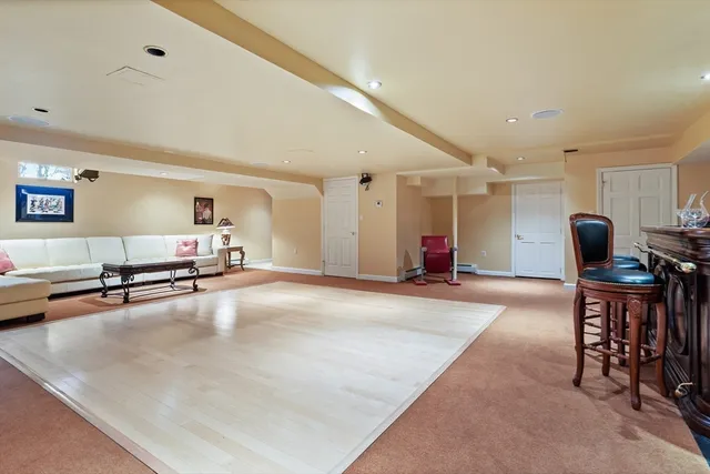 a living room with furniture and a table