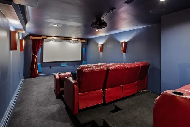 a bedroom with a bed and a mirror