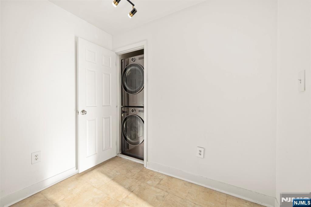 100 Crown Court, Unit 482 Edgewater, NJ 07020 - Photo 14 of 16 a view of a storage & utility room with a sink