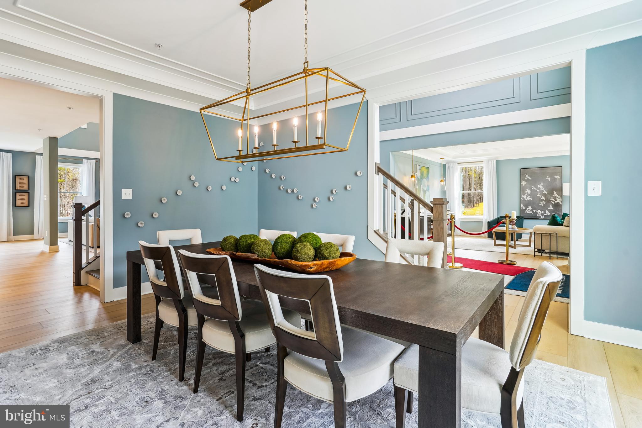 4996 Ilchester Road Ellicott City, MD 21043 - Photo 43 of 74 a view of a dining room with furniture and wooden floor