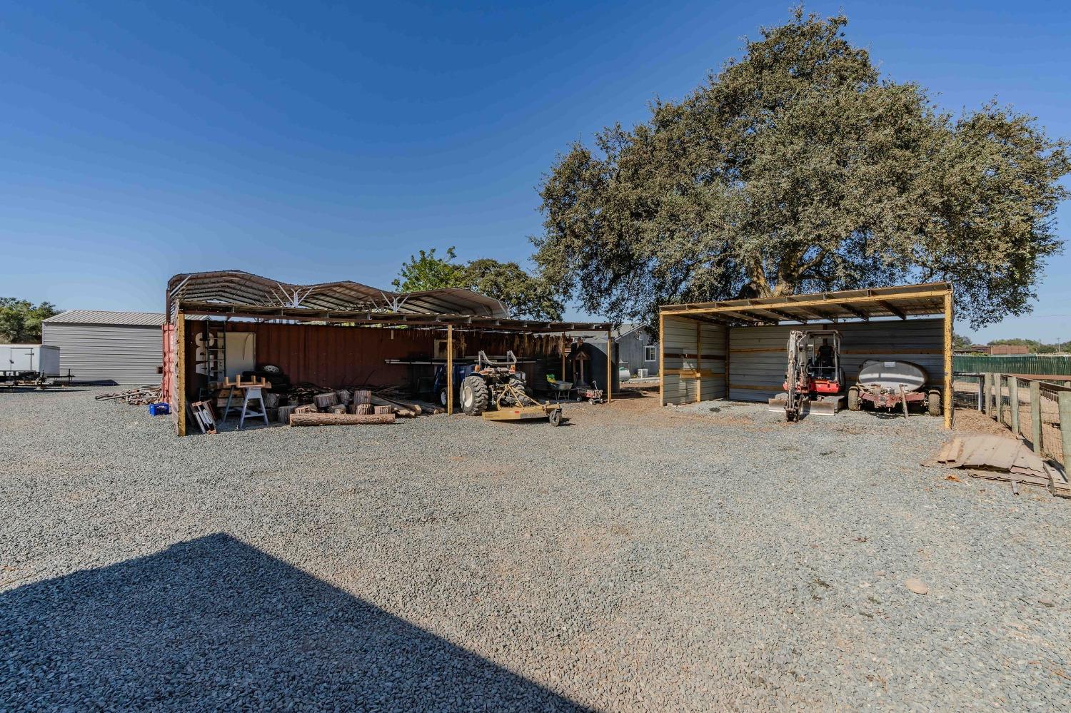 3585 South Burson Road Valley Springs, CA 95252 - Photo 29 of 99 a view of a car parked in front of a house