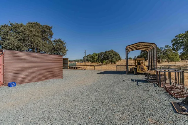 a bathroom with a sink mirror and toilet