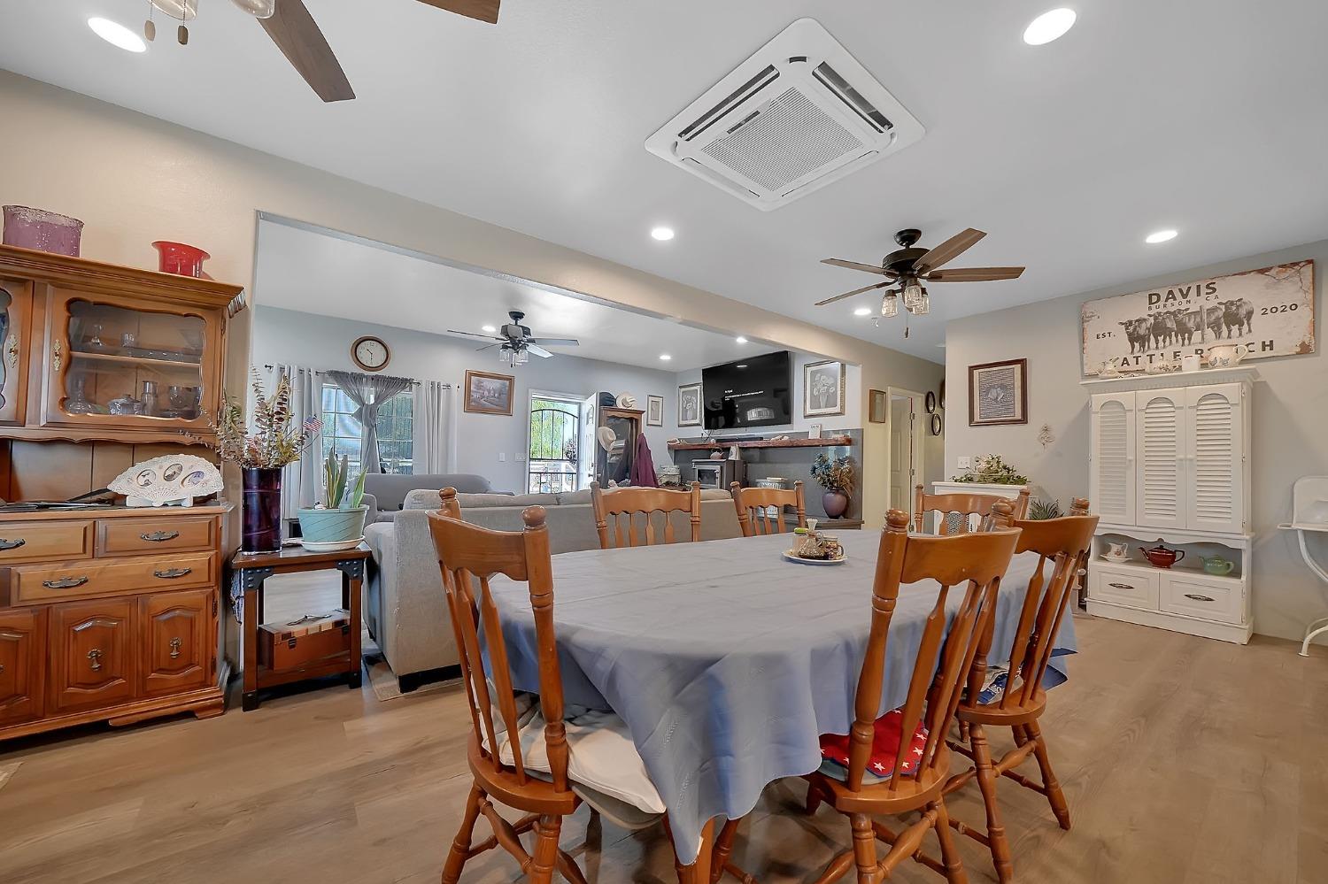 3585 South Burson Road Valley Springs, CA 95252 - Photo 62 of 99 a view of a dining room with furniture and a kitchen