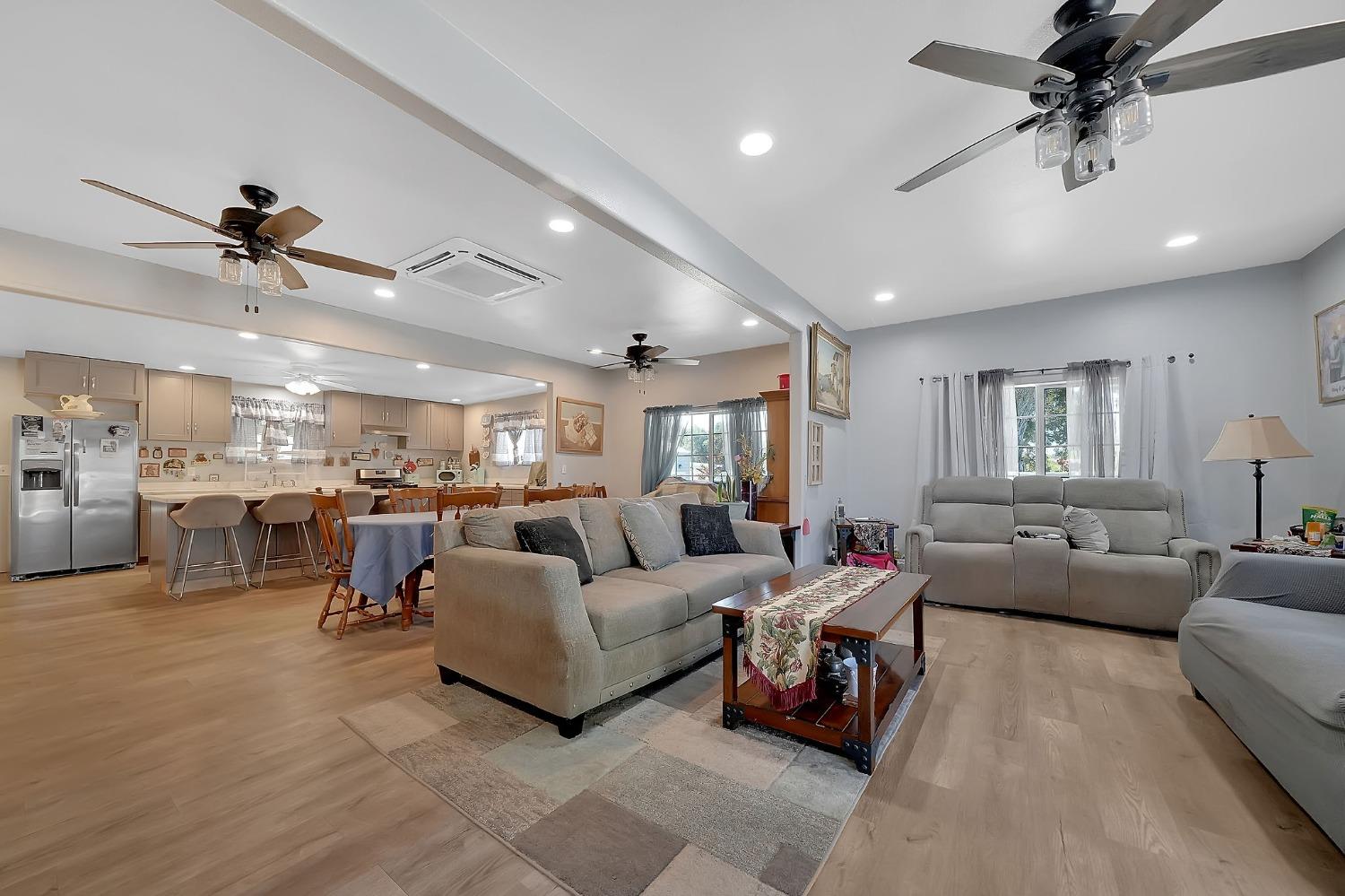 3585 South Burson Road Valley Springs, CA 95252 - Photo 64 of 99 a living room with furniture and a ceiling fan