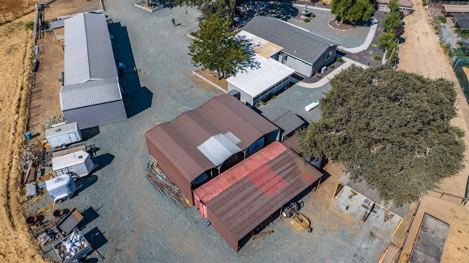 3585 South Burson Road Valley Springs, CA 95252 - Photo 88 of 99 an aerial view of a house with a yard