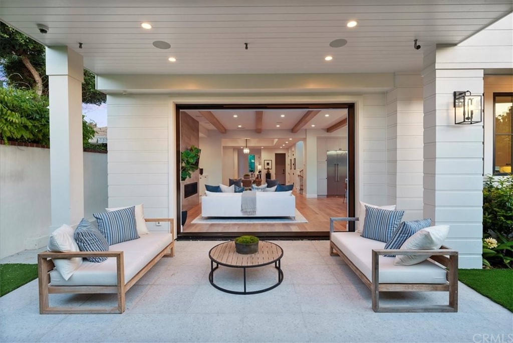 615 23rd Street Manhattan Beach, CA 90266 - Photo 13 of 36 a living room with furniture and a large window
