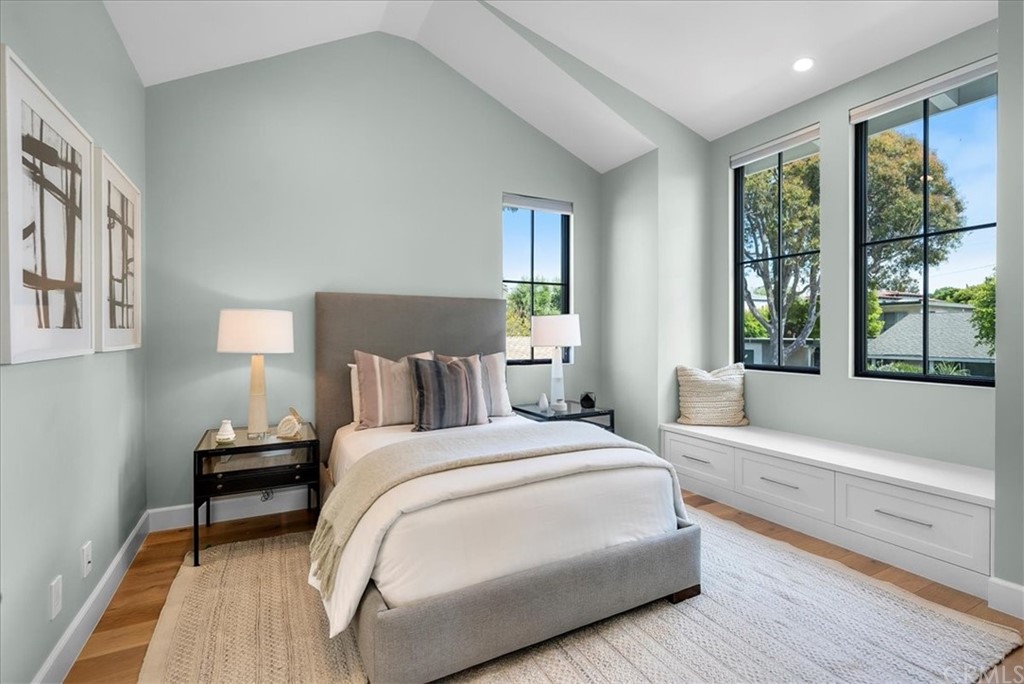 615 23rd Street Manhattan Beach, CA 90266 - Photo 16 of 36 a bedroom with a large bed and a window