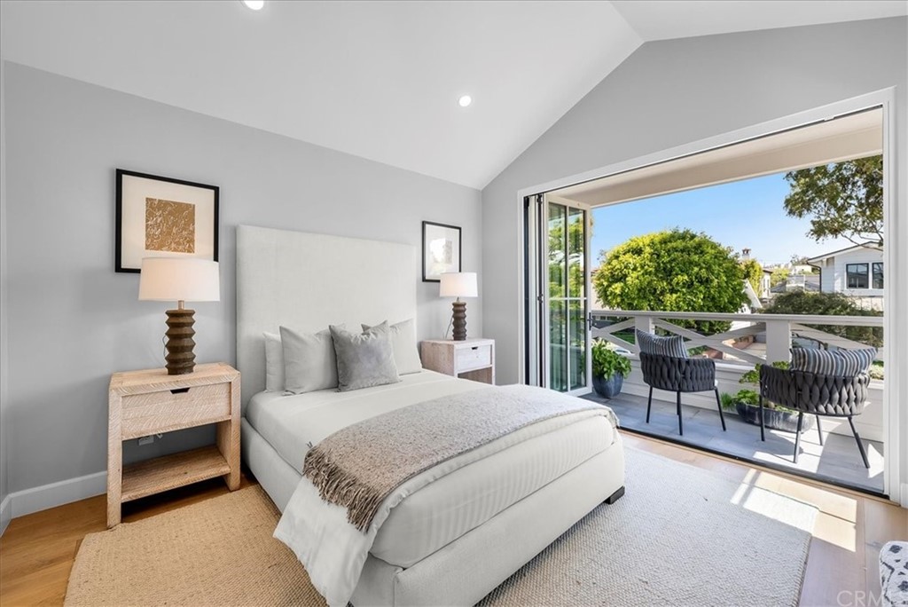 615 23rd Street Manhattan Beach, CA 90266 - Photo 18 of 36 a bedroom with a bed and a large window