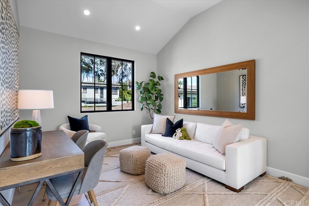 615 23rd Street Manhattan Beach, CA 90266 - Photo 20 of 36 a living room with furniture and a window