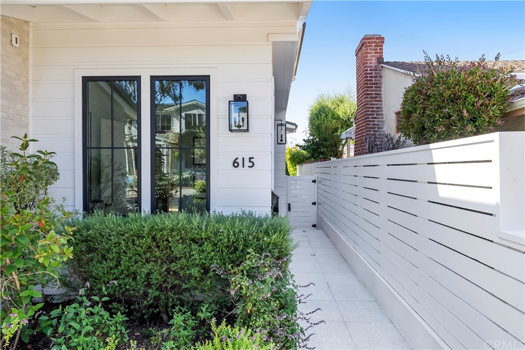 615 23rd Street Manhattan Beach, CA 90266 - Photo 2 of 36 a view of a potted plants in front of main door