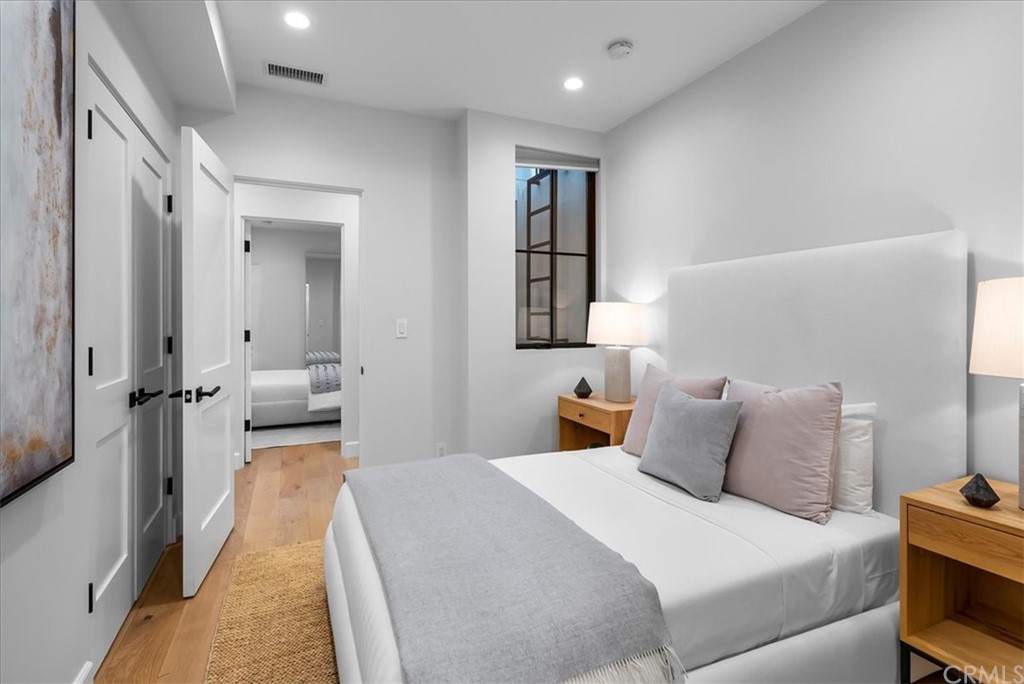 615 23rd Street Manhattan Beach, CA 90266 - Photo 34 of 36 a bedroom with a bed and a couch