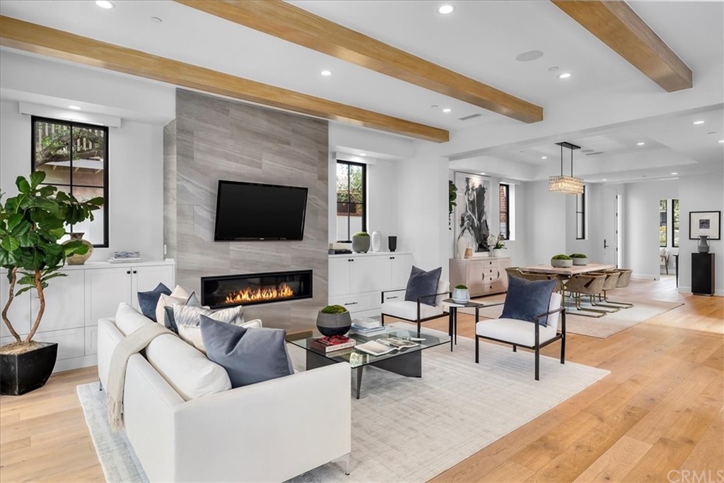 615 23rd Street Manhattan Beach, CA 90266 - Photo 9 of 36 a living room with furniture and a fireplace