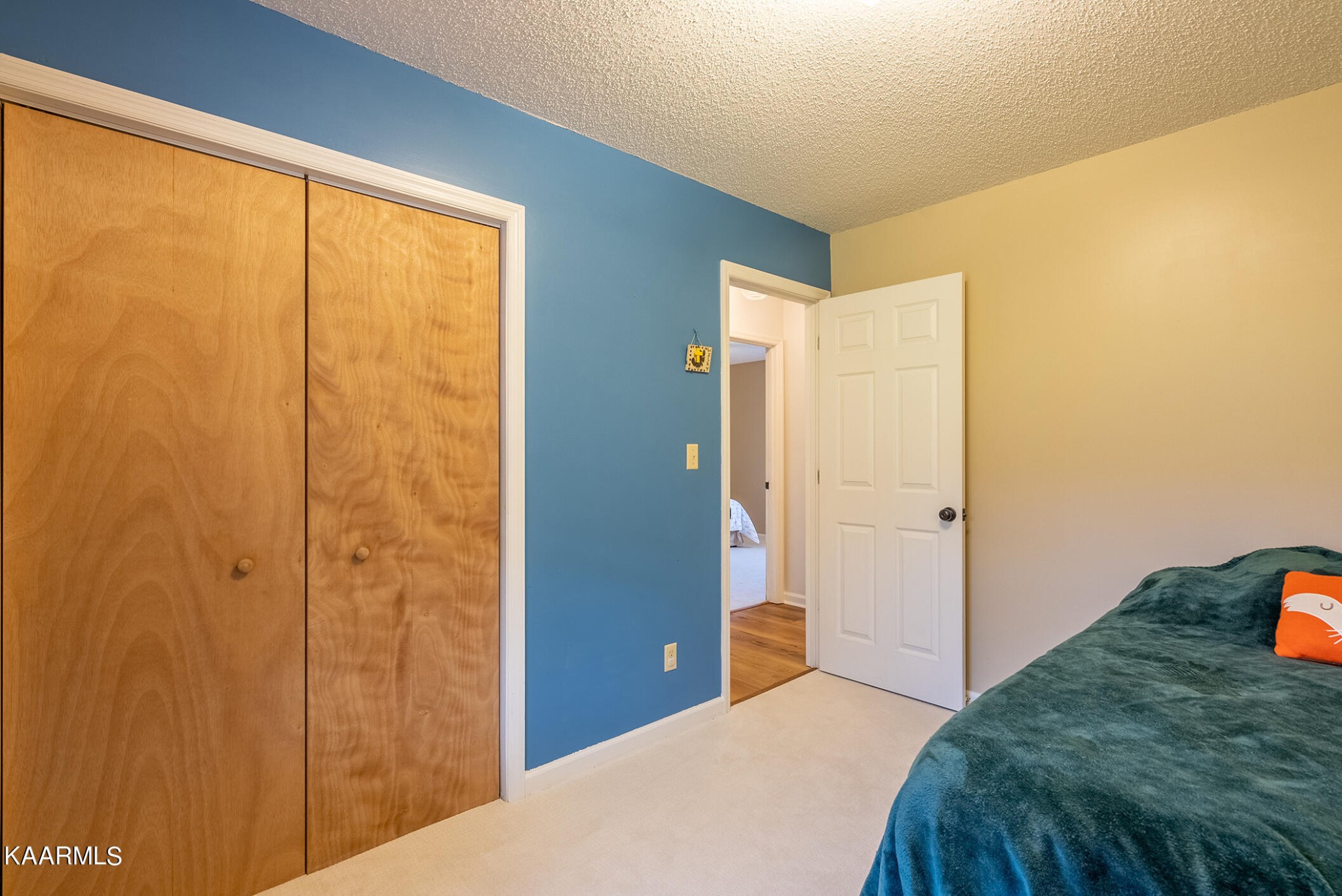 2038 Dutch Valley Road Clinton, TN 37716 - Photo 12 of 51 a bedroom with a bed and wooden floor