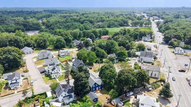 an aerial view of residential house with outdoor space