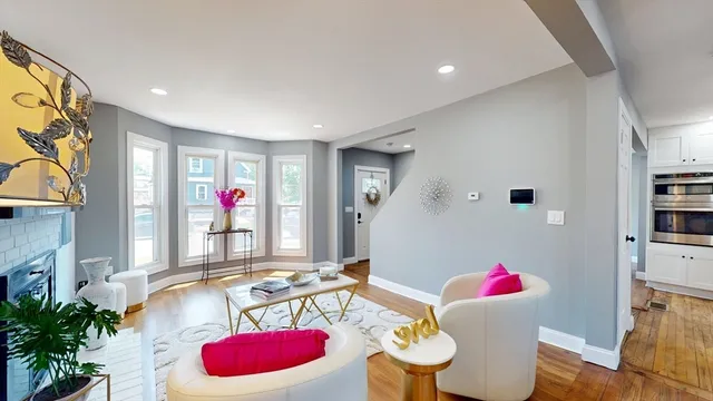 a living room with furniture and a table