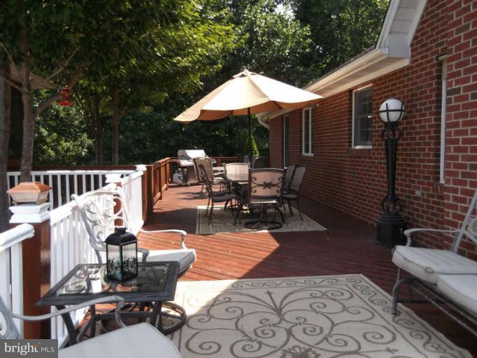 8344 Settle School Road Rixeyville, VA 22737 - Photo 16 of 30 a view of a patio with fire pit