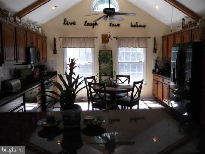 8344 Settle School Road Rixeyville, VA 22737 - Photo 27 of 30 a view of a dining room with furniture