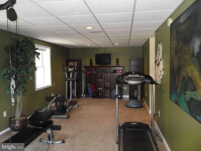 8344 Settle School Road Rixeyville, VA 22737 - Photo 28 of 30 a view of a room with gym equipment