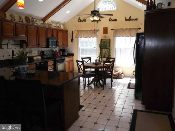 8344 Settle School Road Rixeyville, VA 22737 - Photo 30 of 30 a view of a dining room with furniture