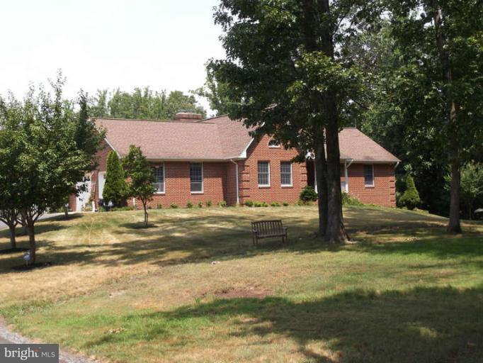 8344 Settle School Road Rixeyville, VA 22737 - Photo 4 of 30 a front view of a house with a yard