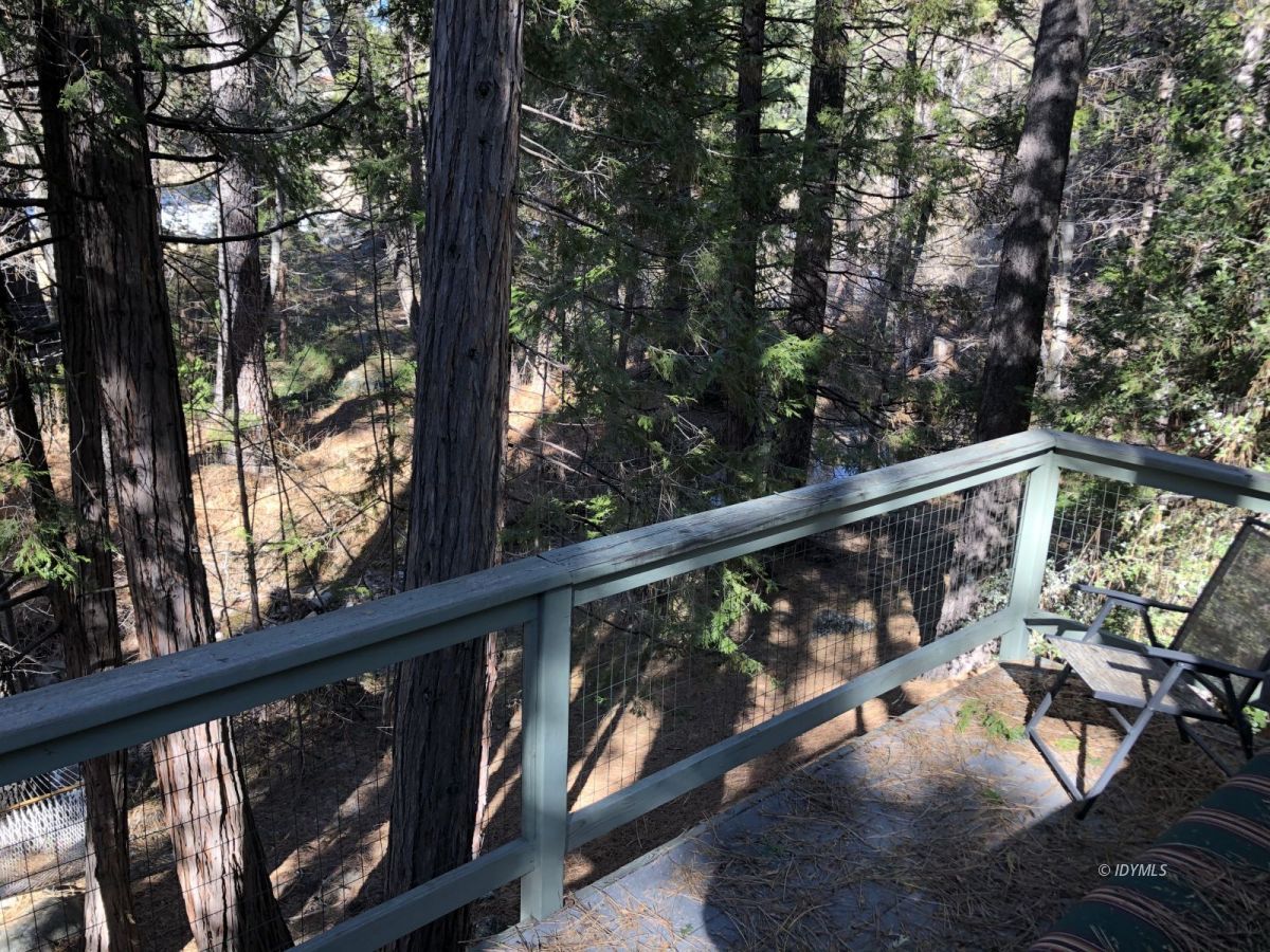 52572 Idyllmont Road Idyllwild, CA 92549 - Photo 11 of 13 a view of balcony with wooden floor and fence