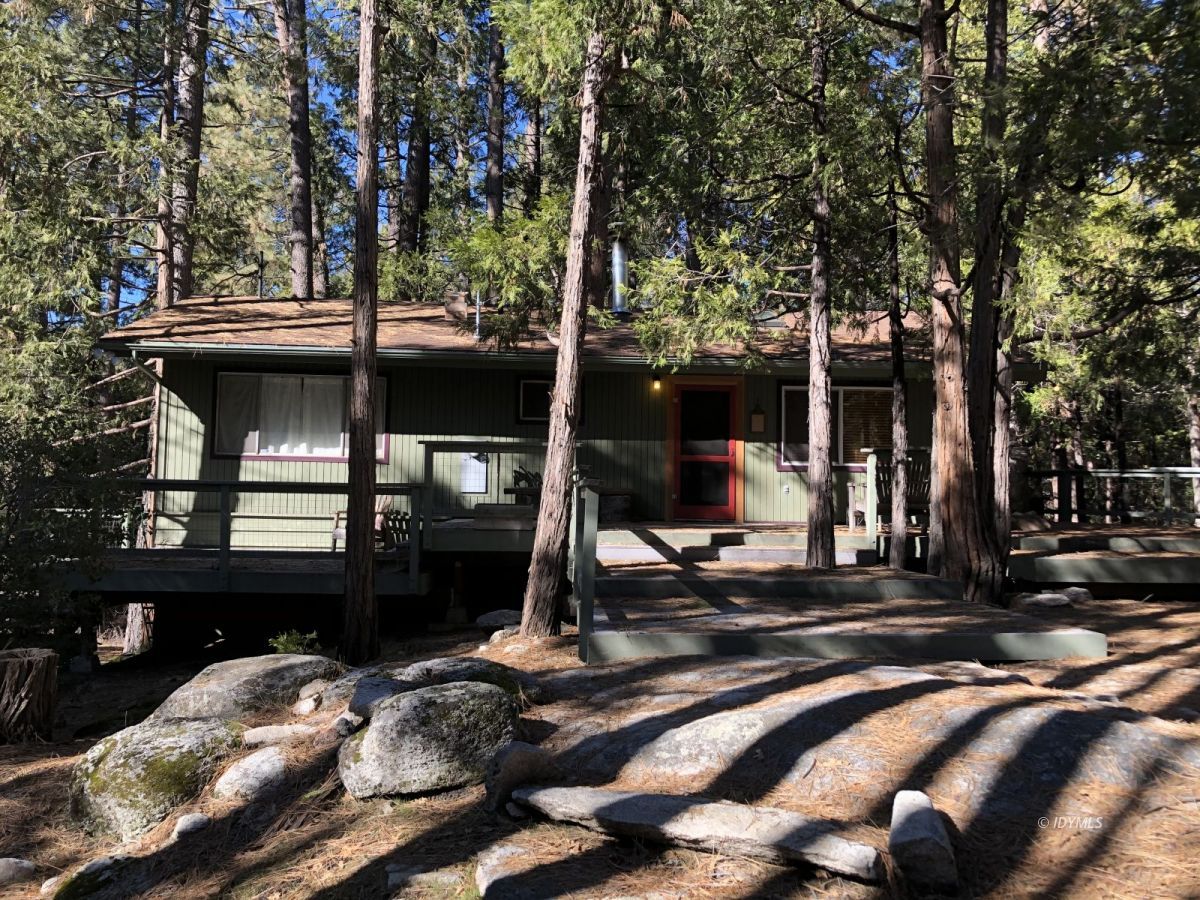 52572 Idyllmont Road Idyllwild, CA 92549 - Photo 2 of 13 a view of a house with a patio