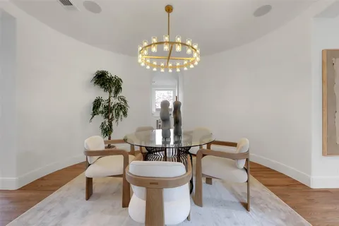 a room with furniture and a chandelier