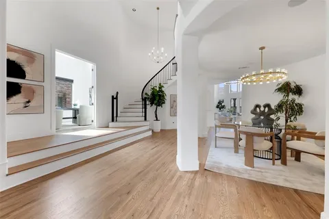 a view of a living room and dining room