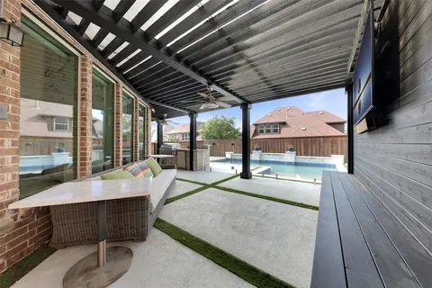 a view of swimming pool with outdoor seating