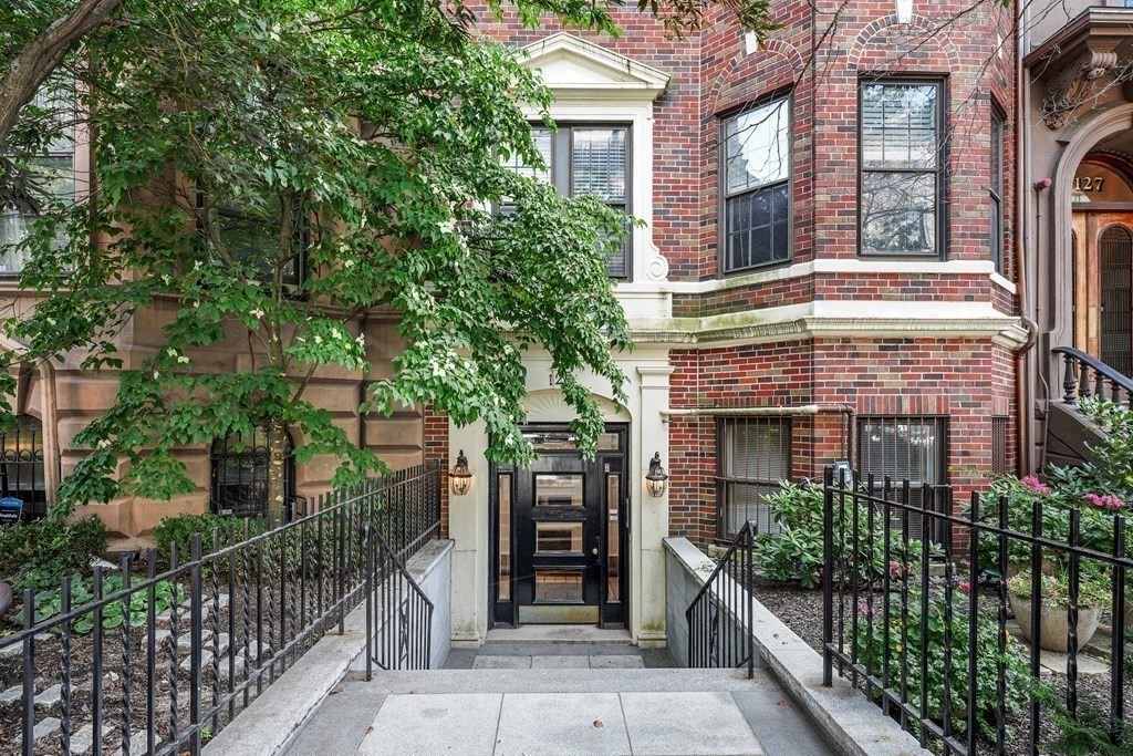125 Beacon Street, Unit 5 Boston, MA 02116 - Photo 12 of 13 a front view of a house with a glass door