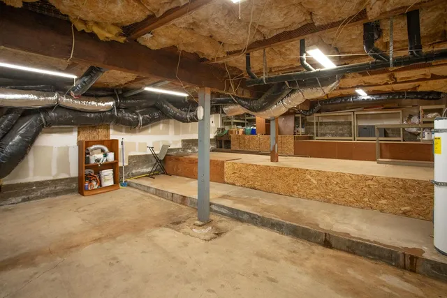 a view of a garage with wooden floor