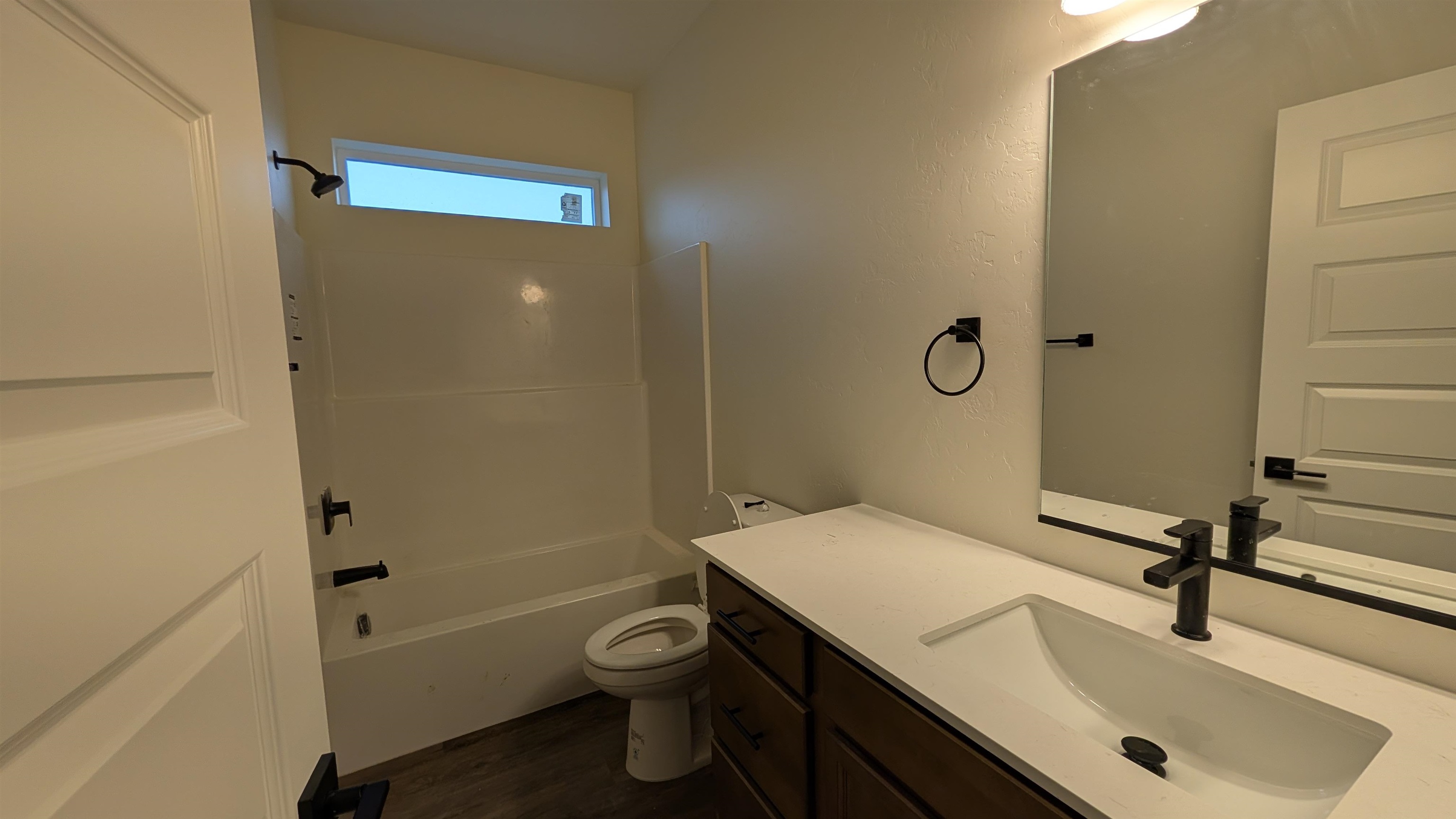 2474 Revere Road Grand Junction, CO 81505 - Photo 7 of 13 a bathroom with a sink a toilet and shower