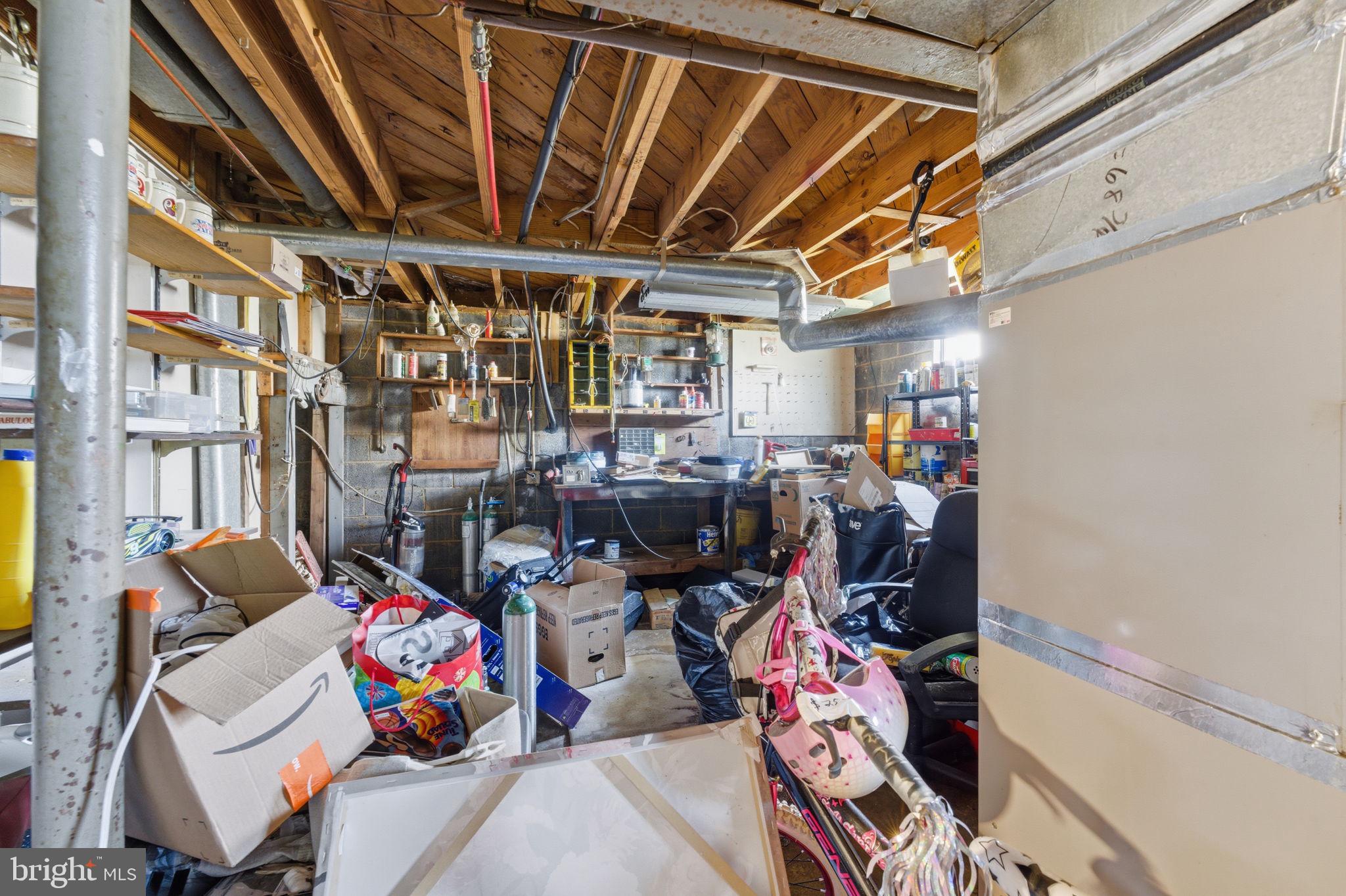 7812 Amherst Drive Manassas, VA 20111 - Photo 23 of 36 a view of a storage room with a lot of stuff