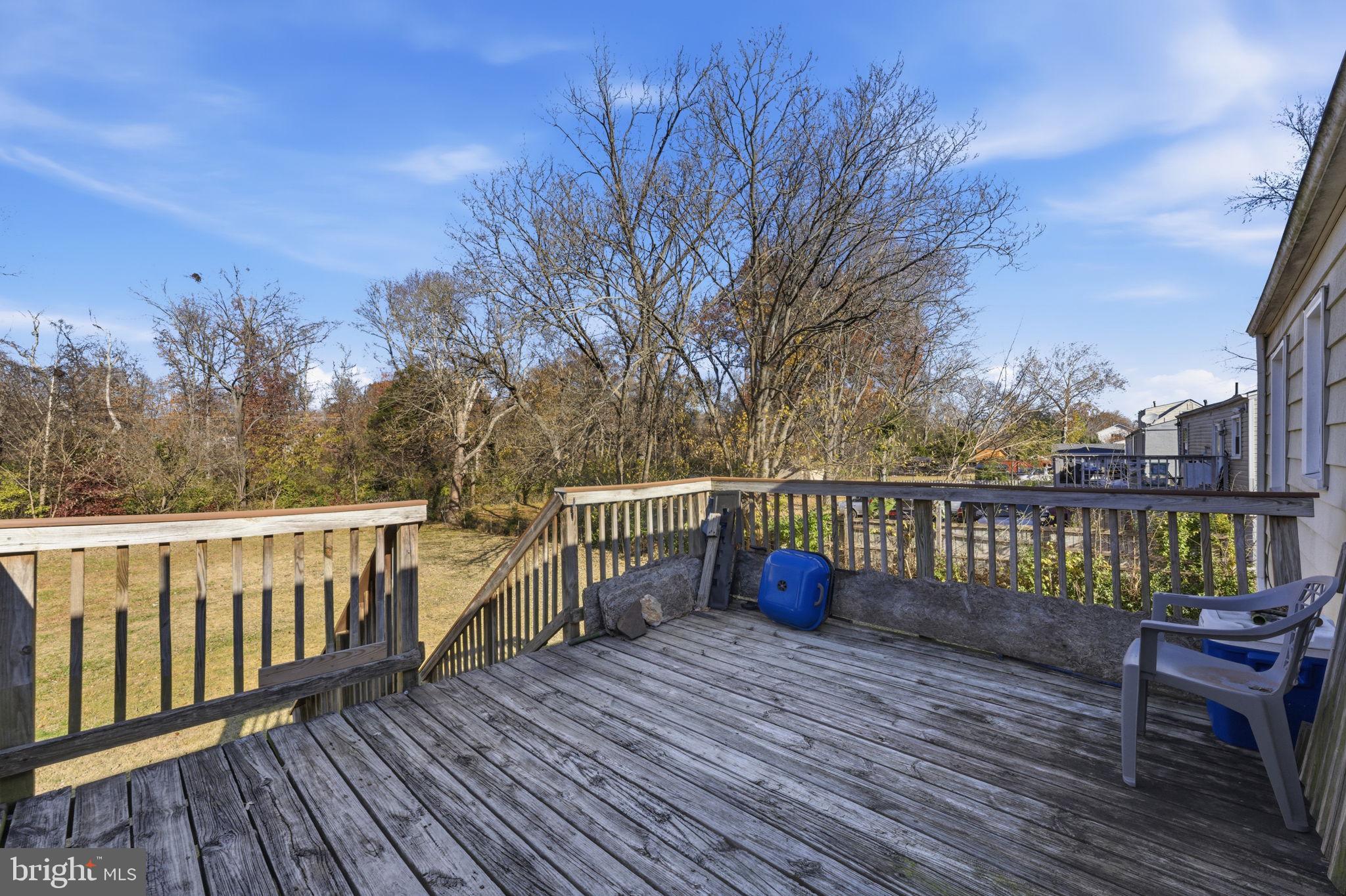 7812 Amherst Drive Manassas, VA 20111 - Photo 25 of 36 a view of balcony with wooden floor and fence