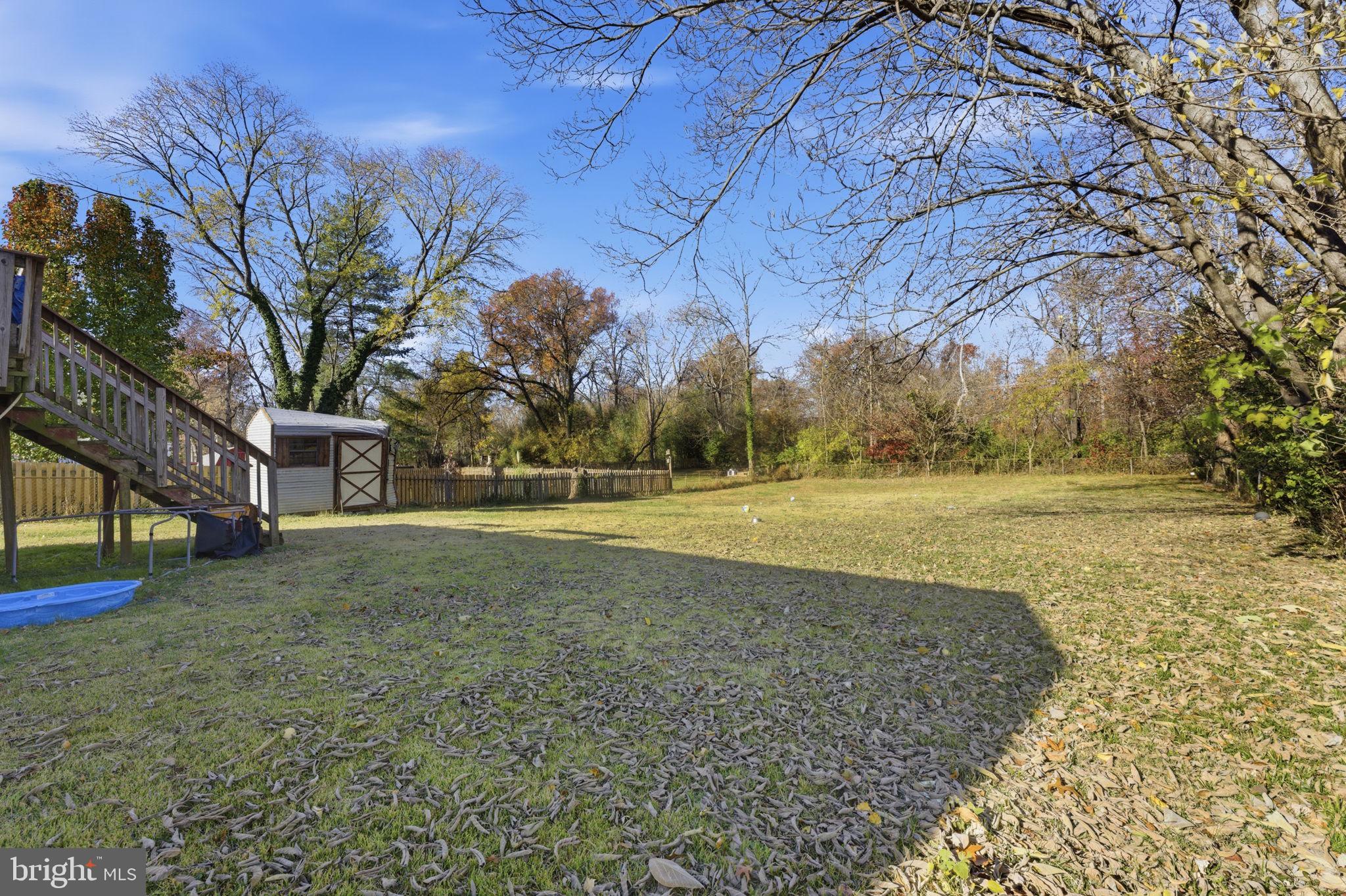 7812 Amherst Drive Manassas, VA 20111 - Photo 28 of 36 a view of outdoor space with deck and tree