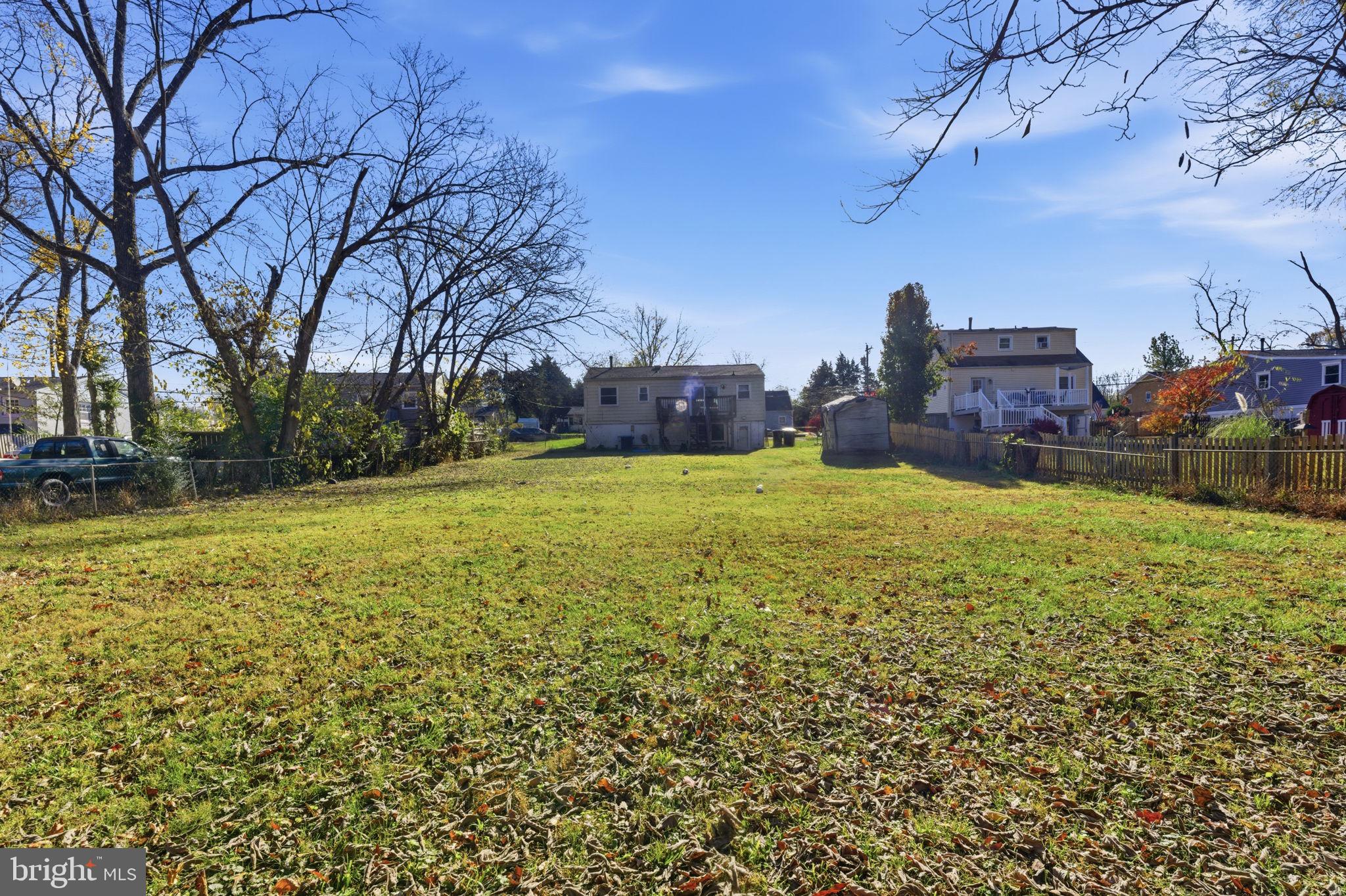 7812 Amherst Drive Manassas, VA 20111 - Photo 29 of 36 a view of a large body of water with a building in the background