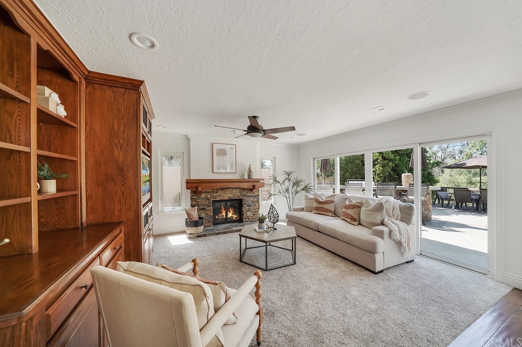 1902 Derby Drive North Tustin, CA 92705 - Photo 22 of 67 a living room with furniture and a fireplace